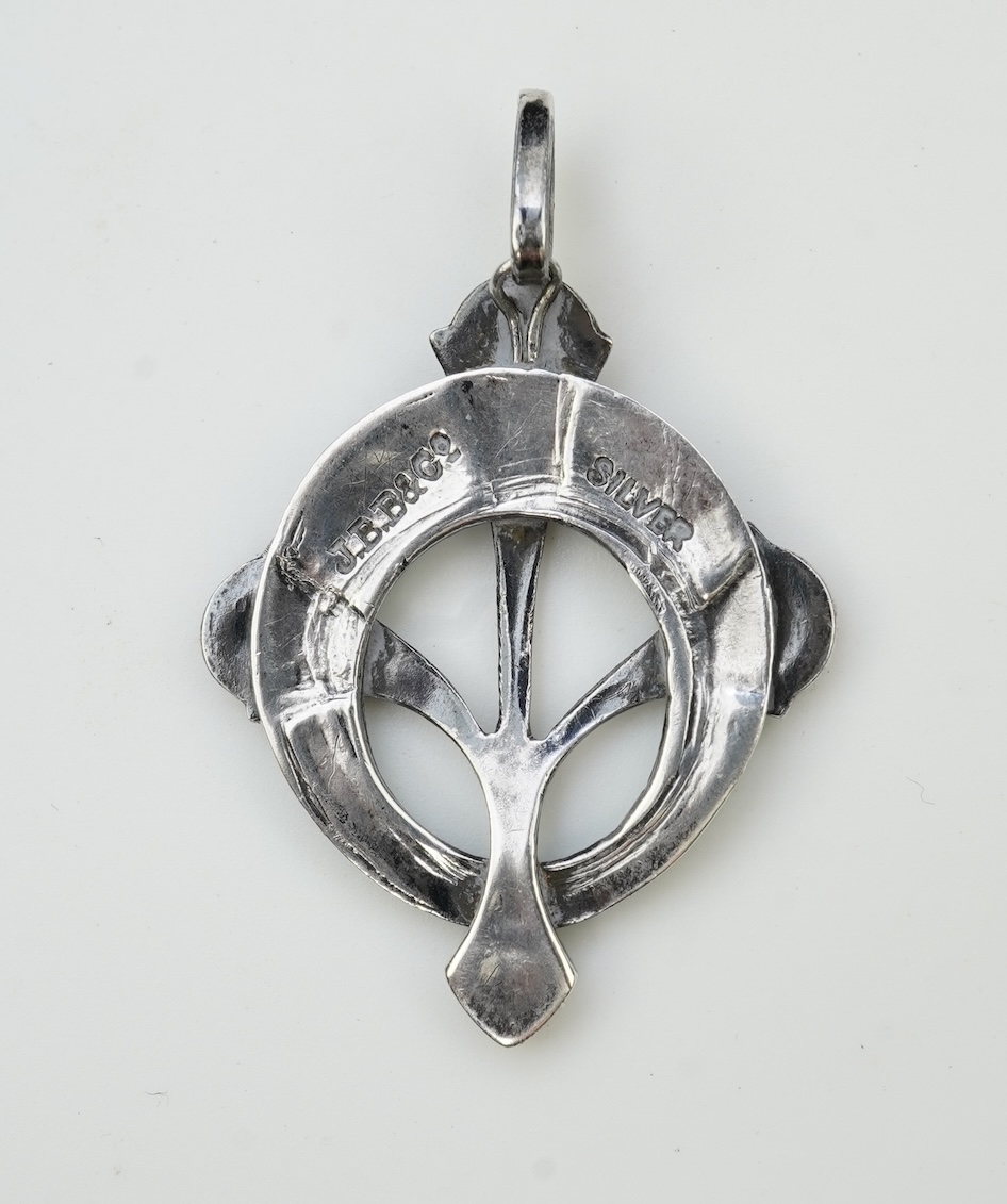 John Baker Bennett & Co., an Arts & Crafts silver and enamel pendant, circa 1905